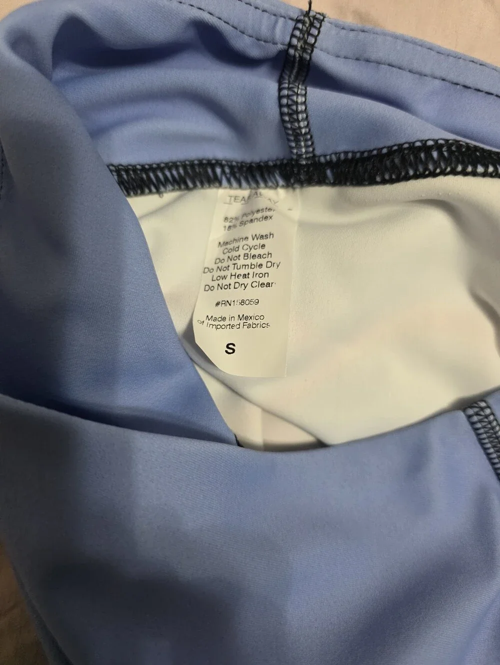 Brand new sports bra in shorts